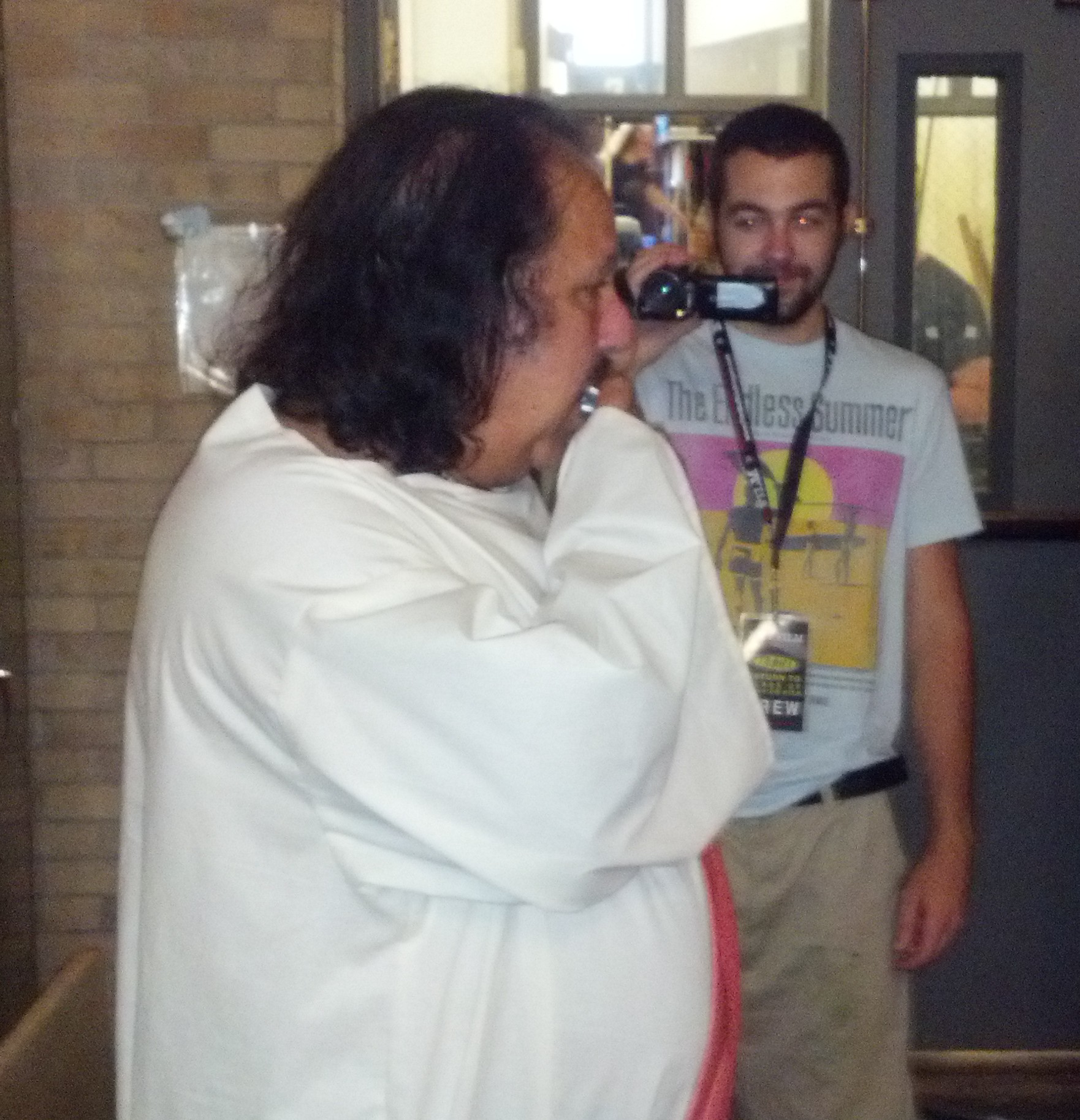 We don't have a lot of pics of us recording at home, so here's Ron Jeremy in a white robe playing the harmonica.